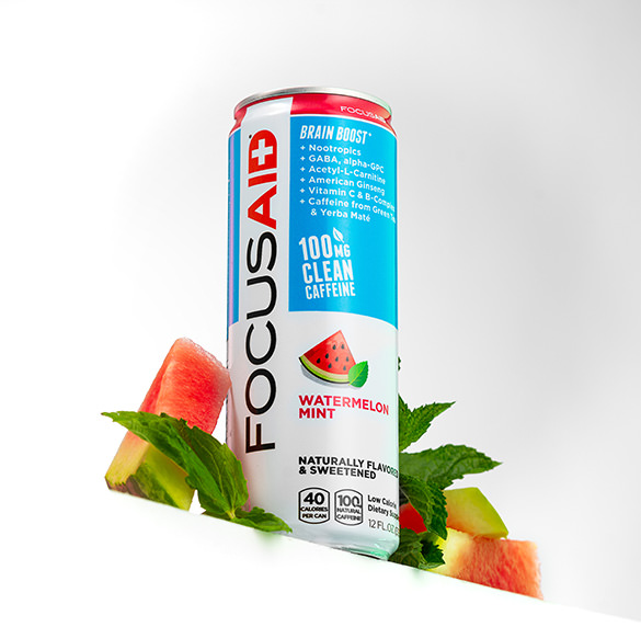 A can of FOCUSAID Watermelon Mint surrounded by slices of watermelon.