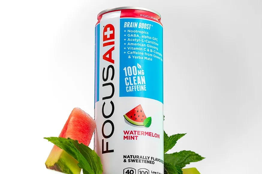 A can of FOCUSAID Watermelon Mint surrounded by slices of watermelon.