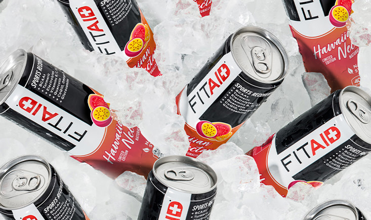 Several cans of FITAID Hawaiian Nectar surrounded by ice cubes.